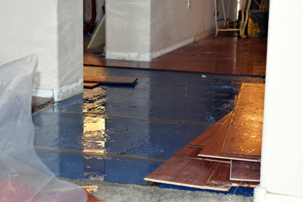 Professional Flood Cleanup technician working in Lancaster, MA